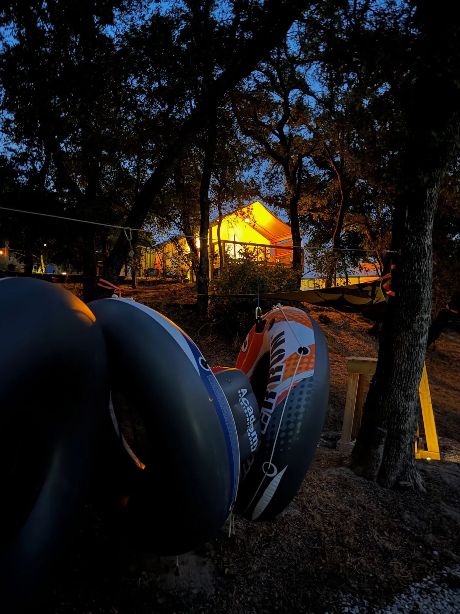 Tubes stacked, tent aglow